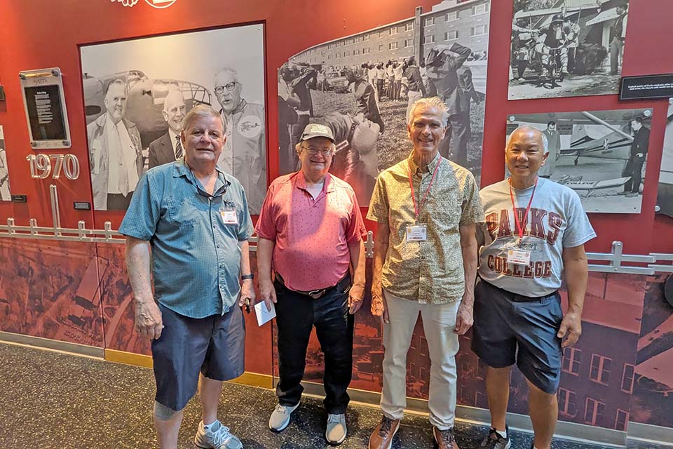 Alpha Pi Sigma  Alpha Pi Sigma Fraternity brothers pose for a photo at a reunion