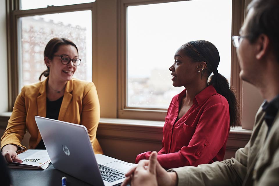 Graduate students work on consulting project