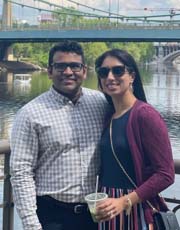 photo of Jay Patel, M.D. standing next to a woman with a river in the background photo of Jay Patel, M.D. standing next to a woman with a river in the background